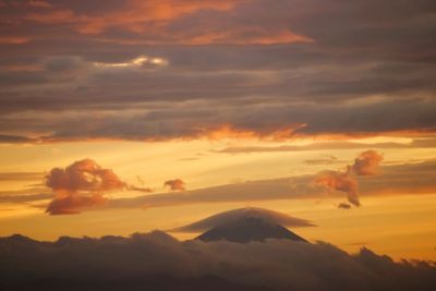 Scenic view of mountains at sunset