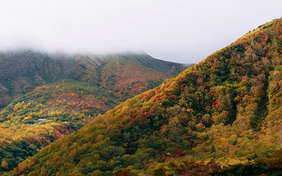 Scenic view of mountains against sky during autumn