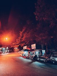 Traffic on road in city at night