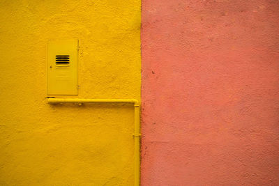 Full frame shot of yellow wall of building