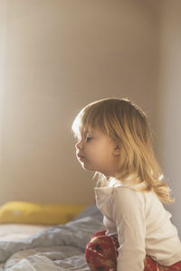 Adorable baby at home at sunset