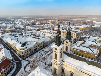 High angle view of buildings in city against sky