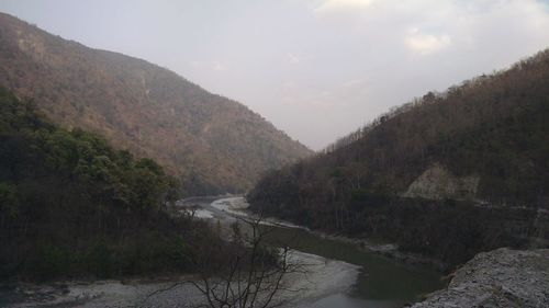 Scenic view of river and mountains