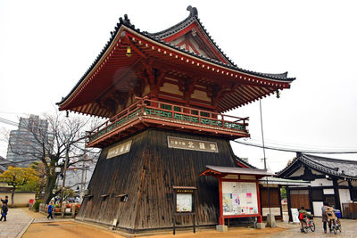 Low angle view of temple building against clear sky