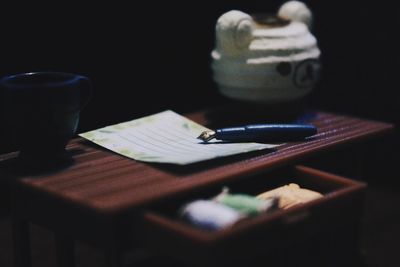 Close-up of coffee cup on table