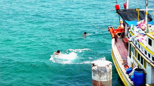 High angle view of people in sea