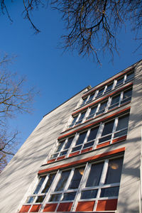 Low angle view of building against clear blue sky