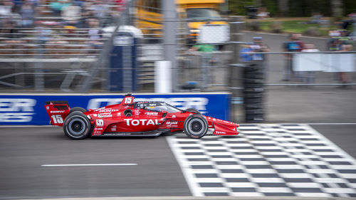 Blurred motion of car on road