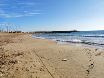 Scenic view of beach against sky