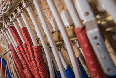 High angle view of colored pencils in row