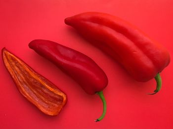 Close-up of red chili peppers on table