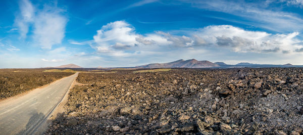 Panoramic view of desert against sky