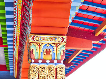 Low angle view of multi colored ceiling in building