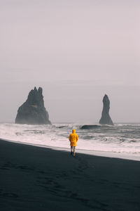 Man walking at beach