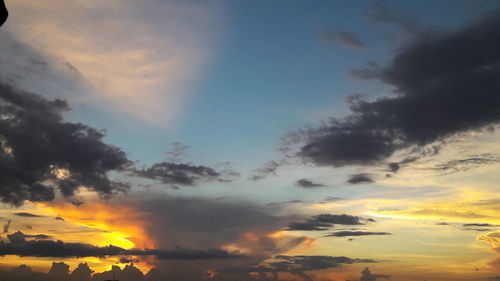 Scenic view of dramatic sky during sunset