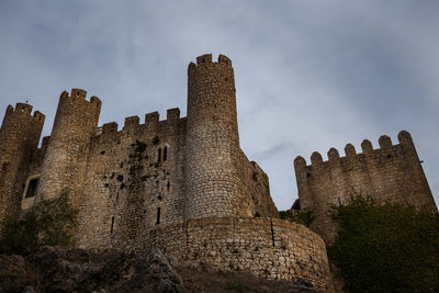 Low angle view of fort against sky