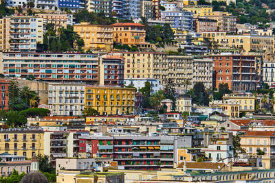 Colorful residential zone with high-rise apartment houses in naples, italy