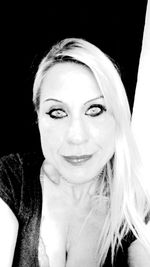 Portrait of young woman with eyes closed