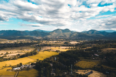 Aerial view of landscape and mountains against sky