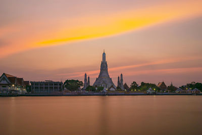 View of buildings against sky during sunset