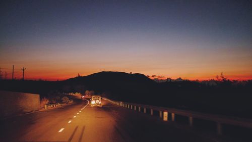 Road leading to mountain range