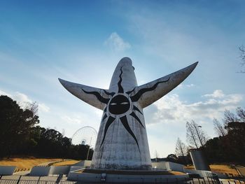 Low angle view of statue against sky