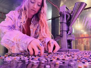 Portrait of young woman in art installation 