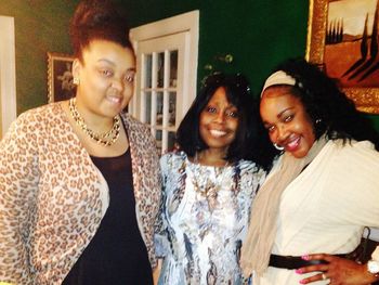 Portrait of smiling young women standing at night