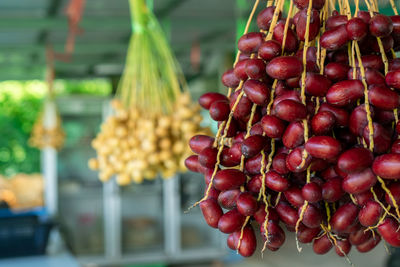 Close-up of red fruits for sale at market stall