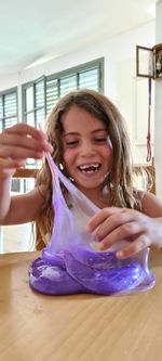 Portrait of smiling girl at home