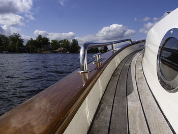 Close-up of railing against sky