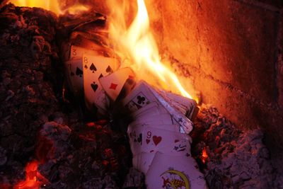 Cards burning at fireplace