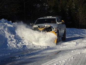 Cars on snow covered road