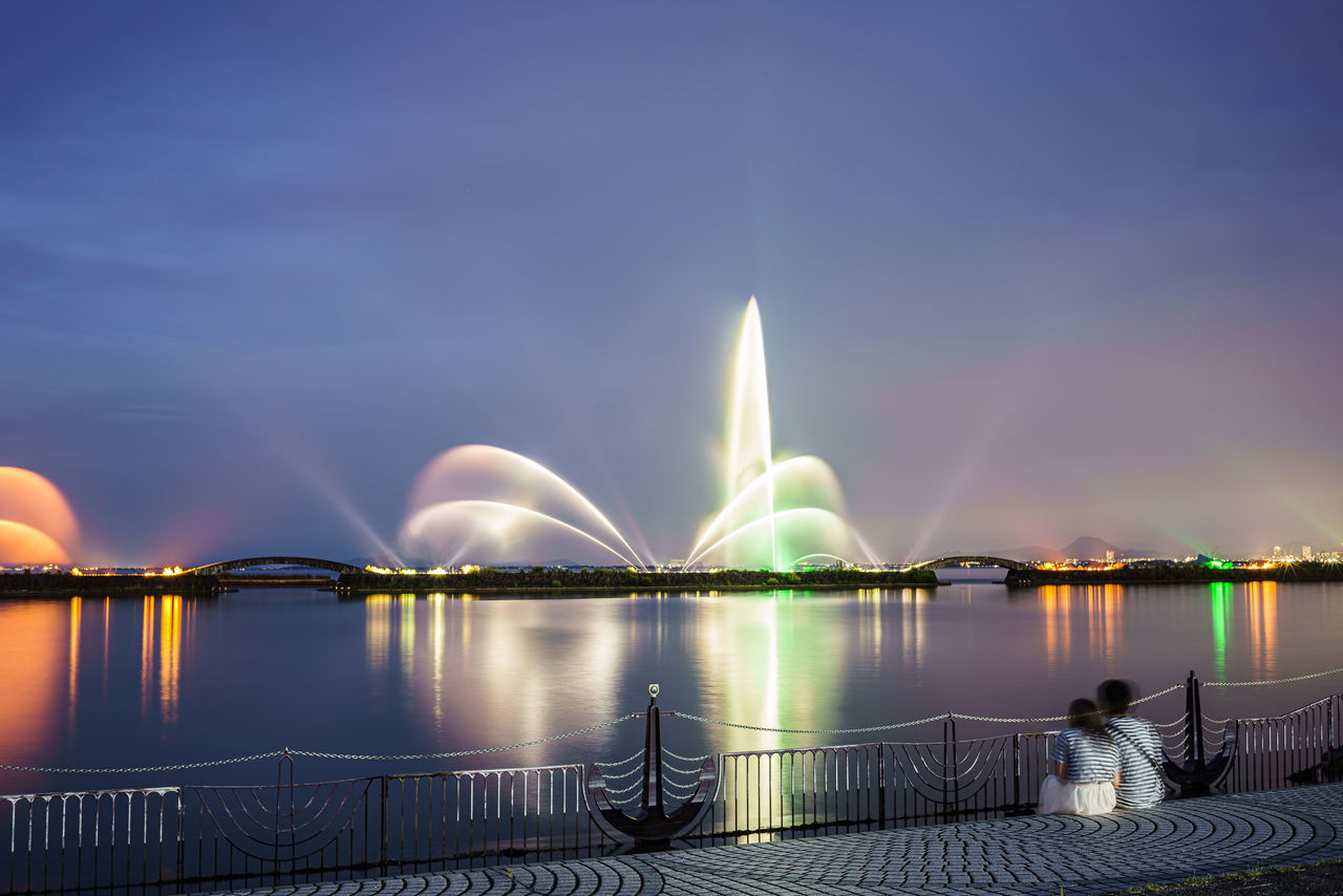 ILLUMINATED BRIDGE AT NIGHT