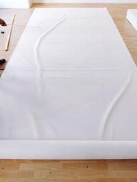 Close-up of white wooden table at home