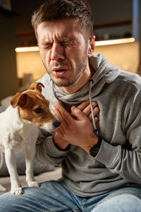 Side view of man with dog