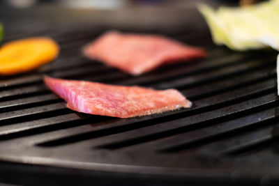 Close-up of bread on barbecue grill