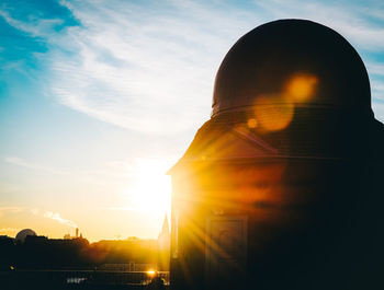 Low angle view of building against sunset sky