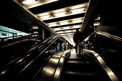 Interior of illuminated subway station