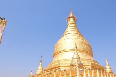 Low angle view of temple building against clear sky