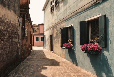 View of a  colorful tranquil street at the island of burano, venice, italy