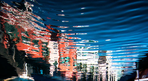 Reflection of trees in water at night