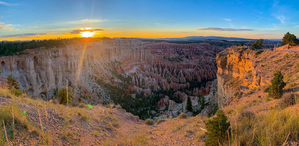 Panoramic view of landscape against sky during sunset