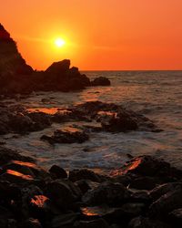 Scenic view of sea against sky during sunset