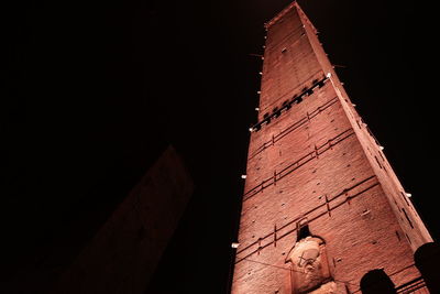 Low angle view of building against sky at night