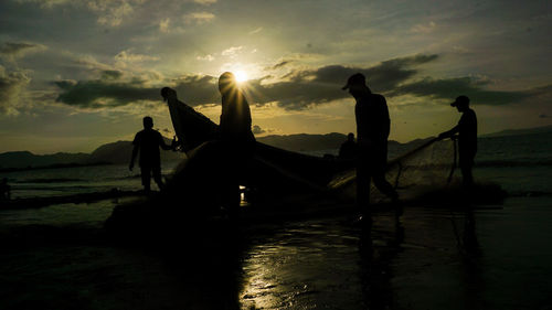 Nellifter is cleaning the net on javanese coast, banda aceh. saturday, january 11, 2020