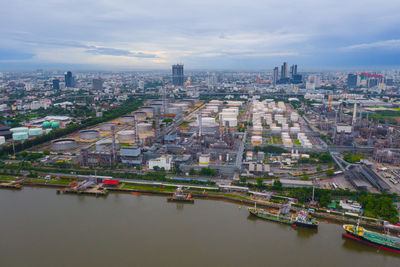 High angle view of river amidst buildings in city