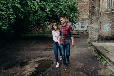 Couple walking on footpath