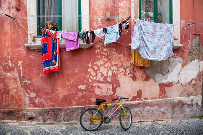 Bicycles on wall of building