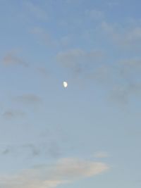 Low angle view of moon against sky